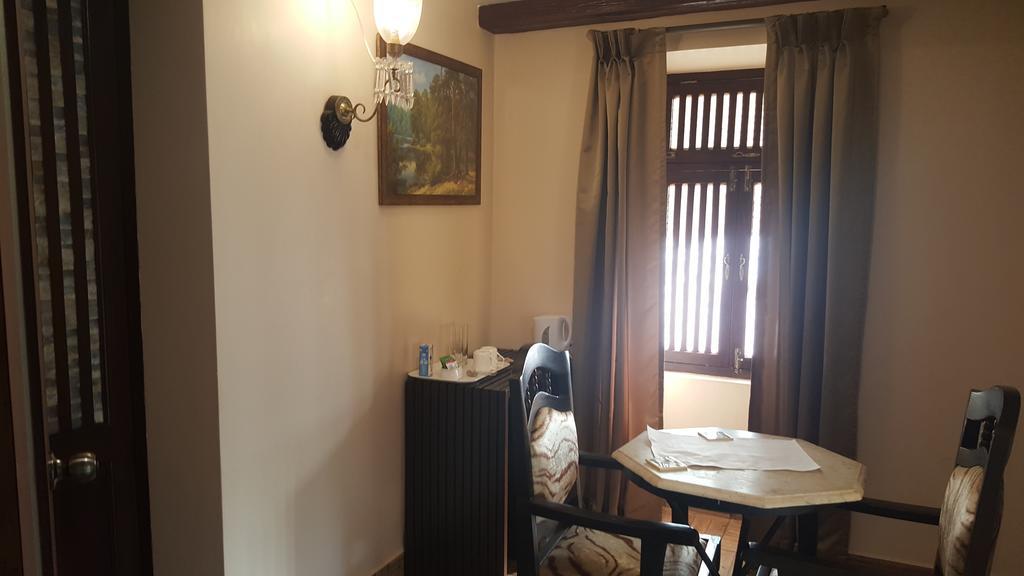 Casa Menezes - A Heritage Goan Homestay Бамболім Номер фото