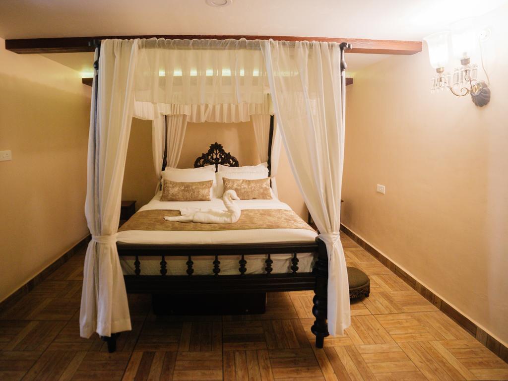 Casa Menezes - A Heritage Goan Homestay Бамболім Екстер'єр фото