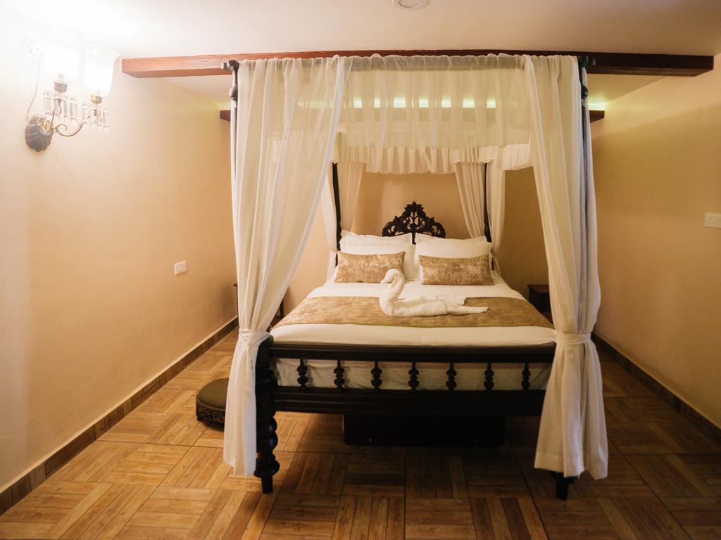 Casa Menezes - A Heritage Goan Homestay Бамболім Екстер'єр фото